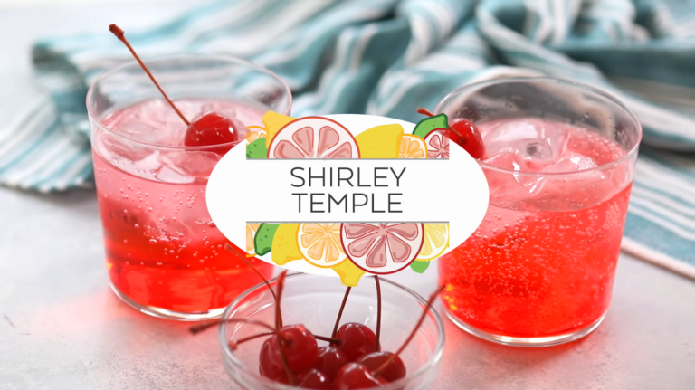 Shirley Temple words, two cocktails, and a striped towel on the table