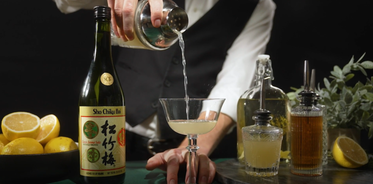 Sake being poured into a wine glass