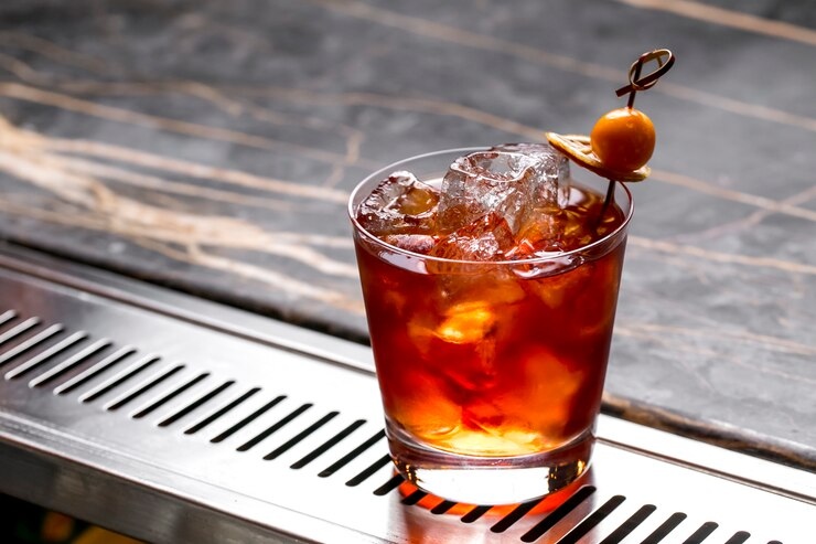 Сocktail with Ice Cubes and Lemon
